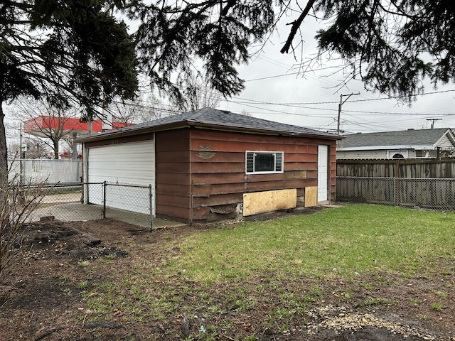 view of outbuilding with a fenced backyard
