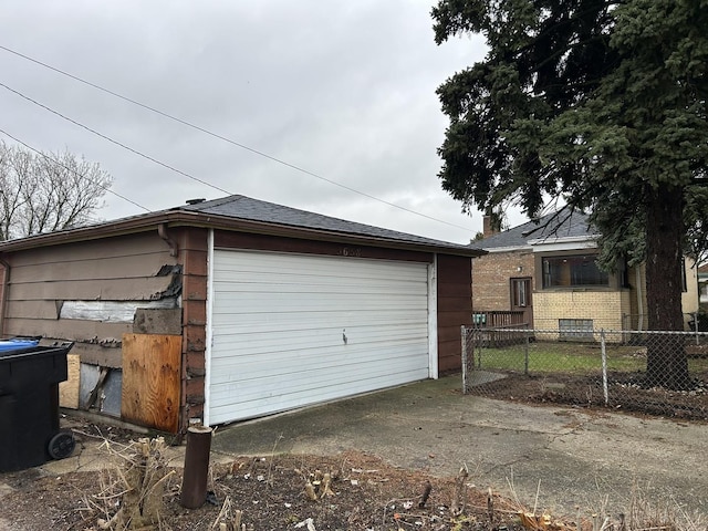 detached garage with fence