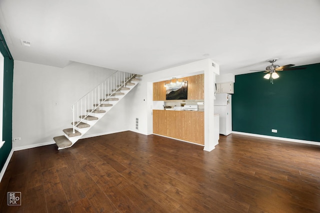 1593 Cornell Pl, Hoffman Estates, IL 60169 - unfurnished living room featuring stairs, ceiling fan, dark wood finished floors, and baseboards