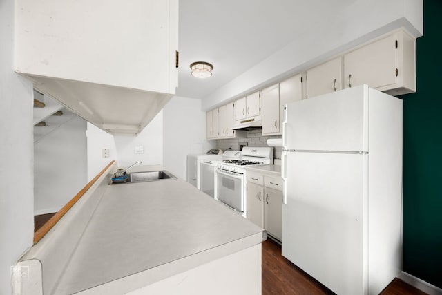 1593 Cornell Pl, Hoffman Estates, IL 60169 - kitchen with white appliances, under cabinet range hood, a sink, dark wood-style flooring, and tasteful backsplash