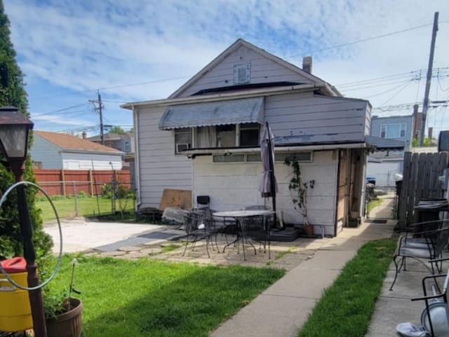 2931 N Monitor Ave, Chicago, IL 60634 - back of property featuring fence and a patio area