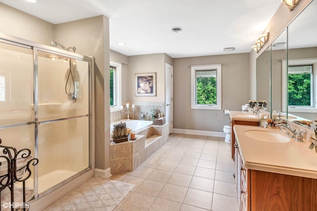 full bathroom with vanity, a stall shower, tile patterned floors, a bath, and visible vents