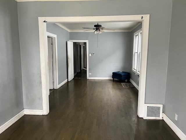 5515 S Hoyne Ave, Chicago, IL 60636 - unfurnished living room with baseboards, crown molding, a ceiling fan, visible vents, and wood finished floors