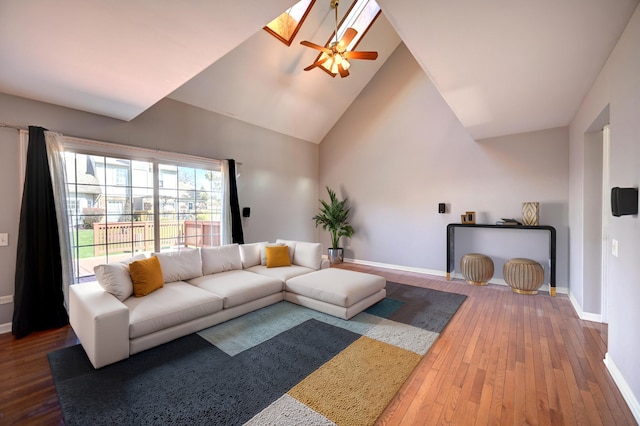 9208 Dexter Ct, Orland Park, IL 60462 - living room featuring baseboards, a ceiling fan, wood-type flooring, a skylight, and high vaulted ceiling