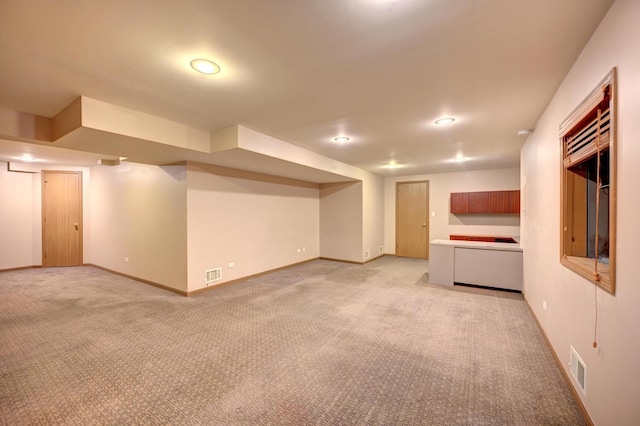 9208 Dexter Ct, Orland Park, IL 60462 - finished basement featuring light carpet, baseboards, and visible vents