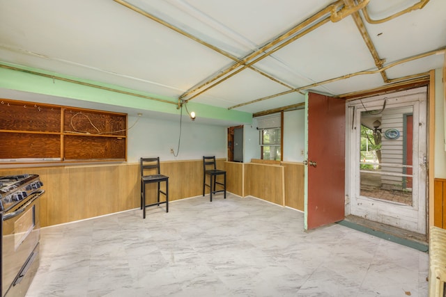 203 High St, West Chicago, IL 60185 - below grade area featuring wood walls and wainscoting