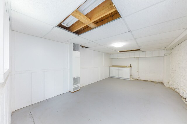 203 High St, West Chicago, IL 60185 - finished basement with a heating unit and a drop ceiling