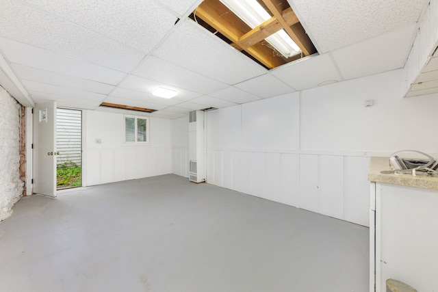203 High St, West Chicago, IL 60185 - below grade area featuring a paneled ceiling