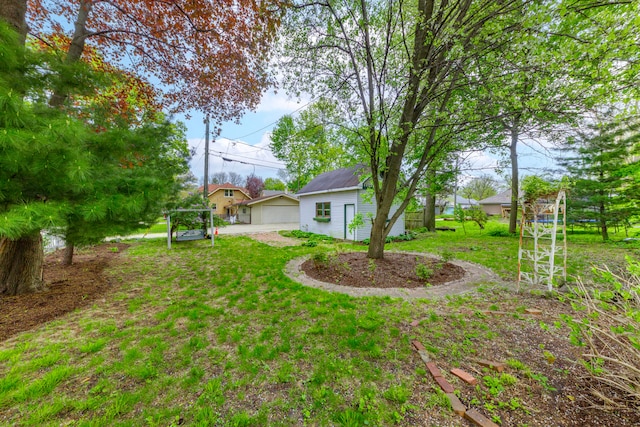 203 High St, West Chicago, IL 60185 - view of green lawn with an outdoor structure