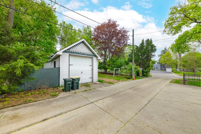 203 High St, West Chicago, IL 60185 - detached garage featuring concrete driveway