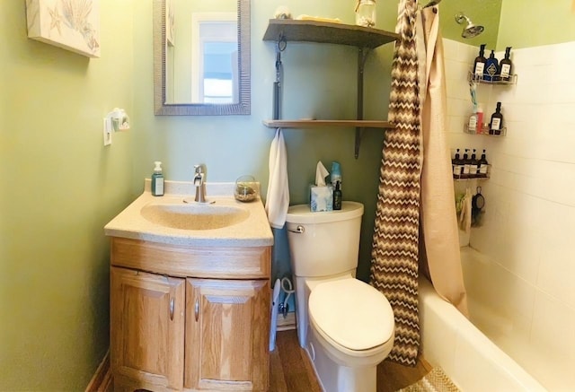 full bath featuring toilet, vanity, and shower / bath combination with curtain