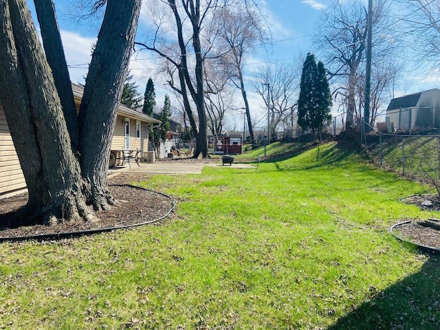 view of yard with a patio area and fence