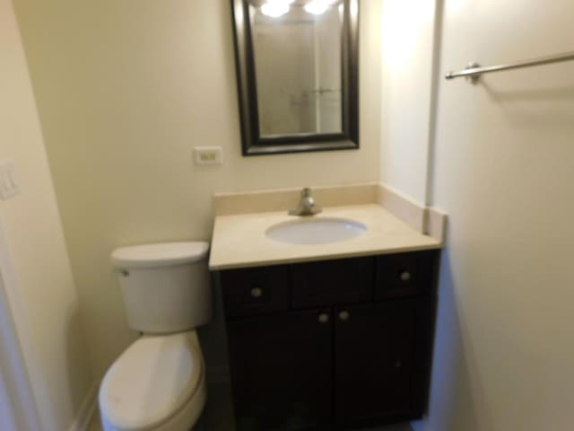 5300 N Lincoln Ave Unit 5A, Chicago, IL 60625 - bathroom featuring toilet and vanity