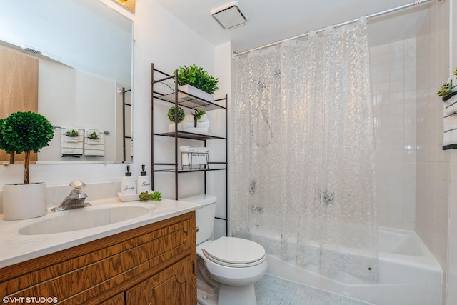 bathroom featuring shower / tub combo, toilet, vanity, and visible vents