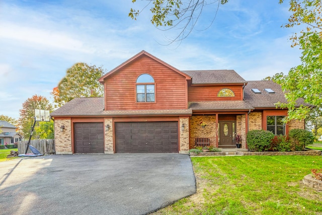 traditional-style house with aphalt driveway, fence, a front lawn, brick siding, and a shingled roof