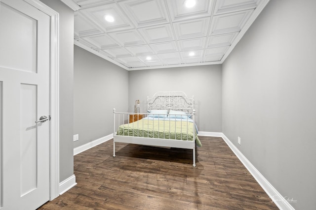 bedroom with an ornate ceiling, baseboards, recessed lighting, and wood finished floors
