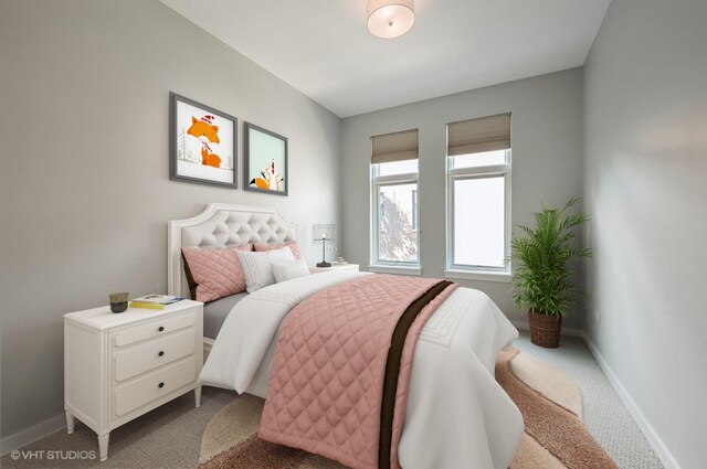 bedroom with baseboards and carpet flooring