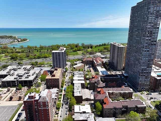 view of urban area featuring a nearby body of water