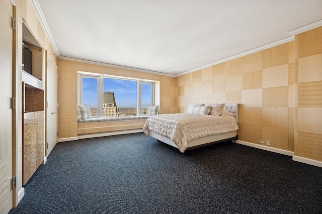 bedroom with baseboards, crown molding, and carpet floors