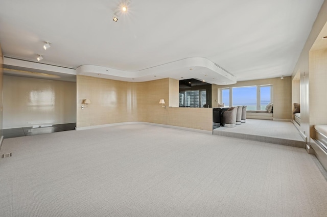 interior space featuring visible vents and carpet flooring