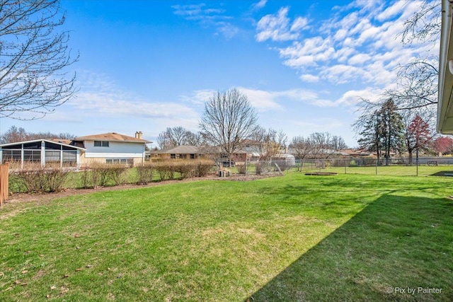 view of yard with fence