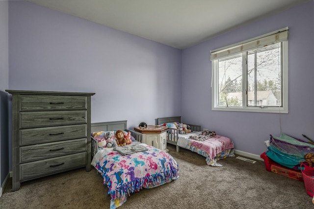 bedroom featuring carpet flooring, baseboards, and visible vents