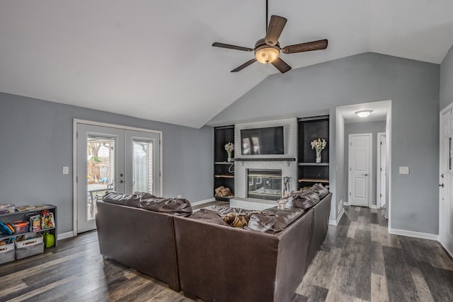 living area featuring french doors, a ceiling fan, dark wood-style flooring, baseboards, and lofted ceiling