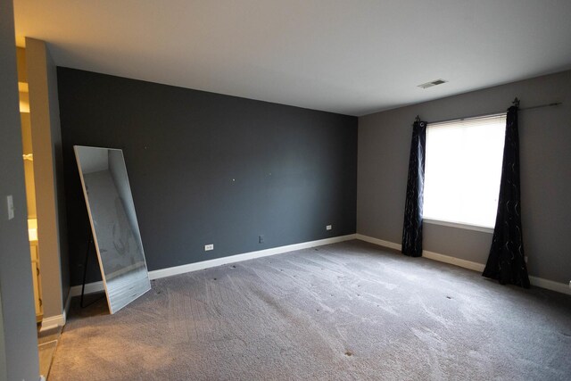 9132 Clairmont Ct Unit 113, Orland Park, IL 60462 - carpeted spare room with visible vents and baseboards