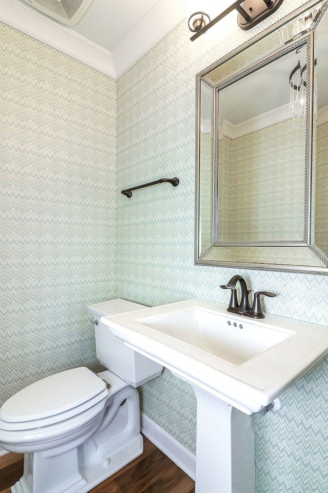4118 Calder Ln, Aurora, IL 60504 - bathroom with ornamental molding, toilet, wood finished floors, and baseboards