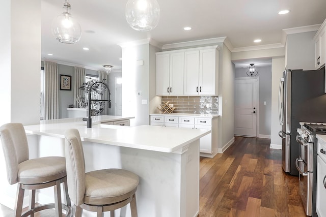 4118 Calder Ln, Aurora, IL 60504 - kitchen featuring range with two ovens, dark wood-style floors, ornamental molding, decorative backsplash, and white cabinetry