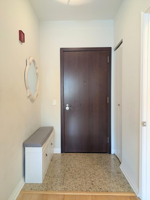 33 W Ontario St Unit 40D, Chicago, IL 60654 - doorway to outside with baseboards