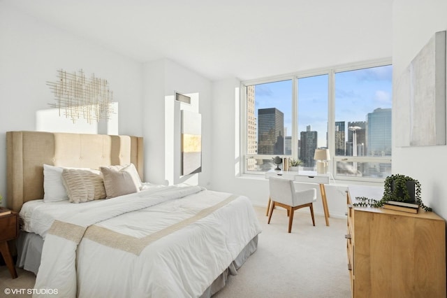 33 W Ontario St Unit 40D, Chicago, IL 60654 - bedroom featuring a view of city, visible vents, light colored carpet, and baseboards