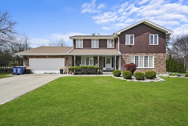 traditional home with a front lawn, brick siding, a garage, covered porch, and driveway