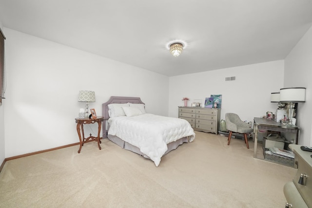 bedroom featuring baseboards, light colored carpet, and visible vents