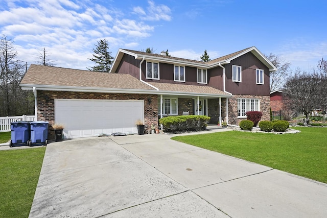 traditional home with covered porch, driveway, a front yard, a garage, and fence
