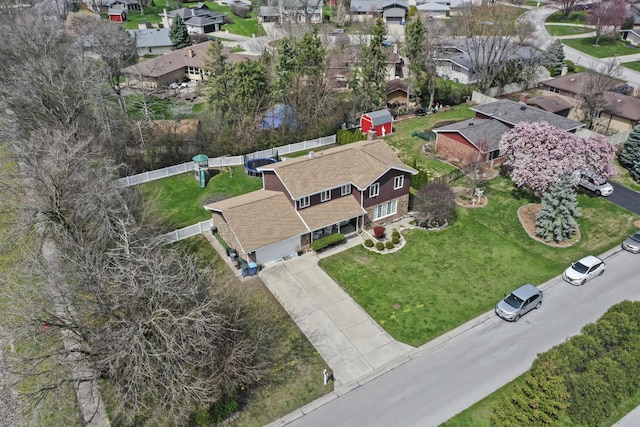 birds eye view of property with a residential view