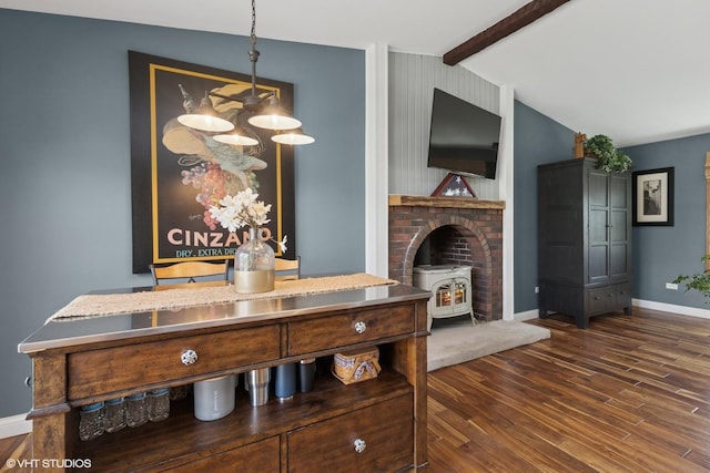 2018 Fairfield Rd, Lindenhurst, IL 60046 - interior space featuring baseboards, dark wood-style floors, vaulted ceiling with beams, and a wood stove