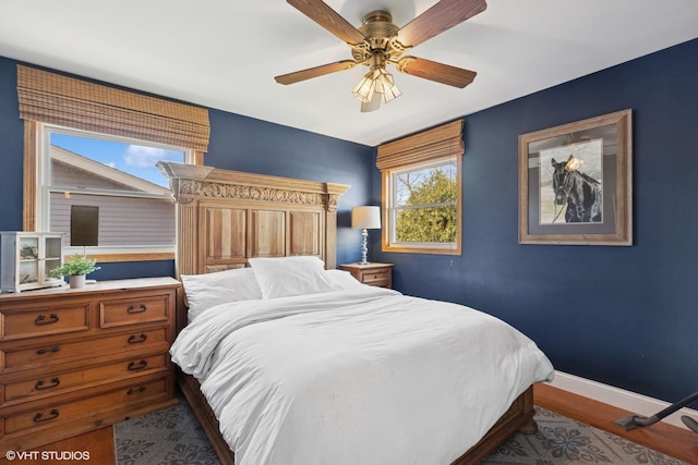2018 Fairfield Rd, Lindenhurst, IL 60046 - bedroom featuring baseboards, ceiling fan, and wood finished floors