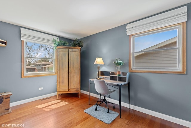 2018 Fairfield Rd, Lindenhurst, IL 60046 - office space featuring baseboards, visible vents, and light wood-type flooring