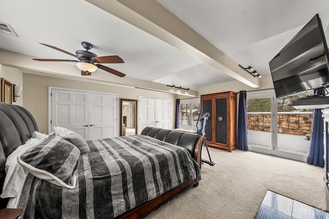 208 Brookdale Ln, Palatine, IL 60067 - bedroom featuring light colored carpet, access to exterior, two closets, and a ceiling fan