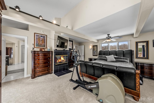 208 Brookdale Ln, Palatine, IL 60067 - bedroom featuring carpet, a tiled fireplace, and beamed ceiling