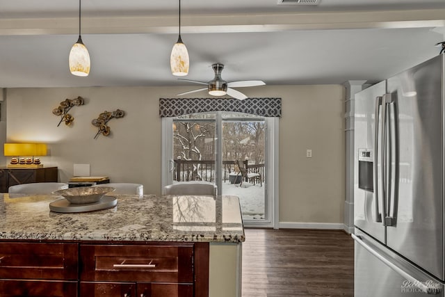 kitchen with stainless steel fridge with ice dispenser, a ceiling fan, visible vents, baseboards, and dark wood-style floors