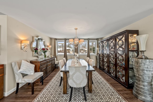 208 Brookdale Ln, Palatine, IL 60067 - dining area featuring a chandelier, dark wood finished floors, and baseboards