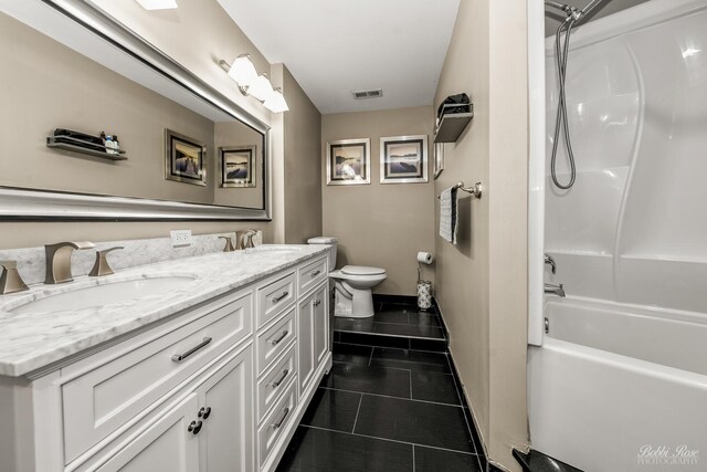 full bath featuring tile patterned flooring, visible vents, toilet, a sink, and double vanity