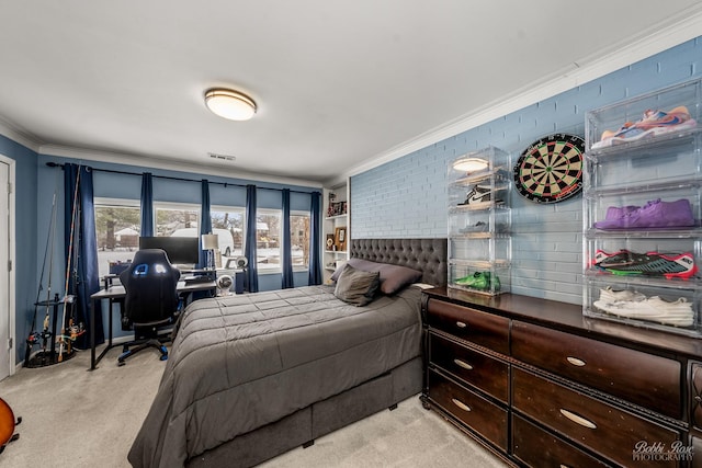 bedroom with light carpet, visible vents, and ornamental molding