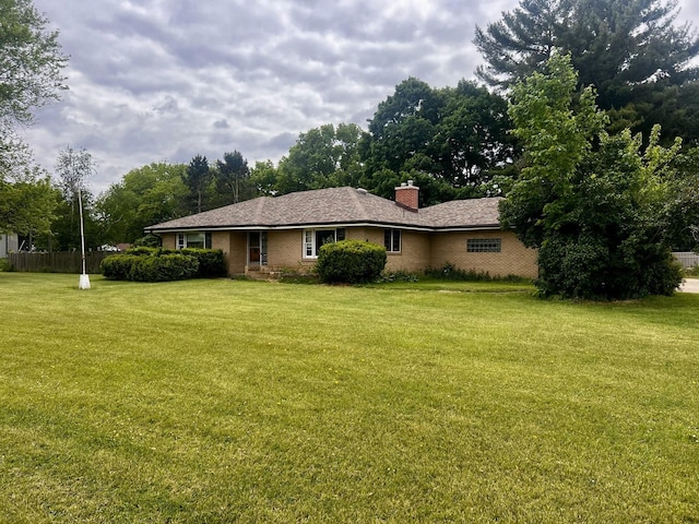 1320 N Il Rte 2, Oregon, IL 61061 - rear view of property with a lawn, a chimney, and brick siding