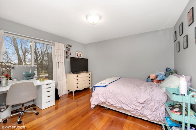 bedroom featuring light wood finished floors