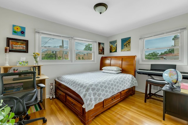 8936 N Elmore St, Niles, IL 60714 - bedroom featuring light wood finished floors and baseboards