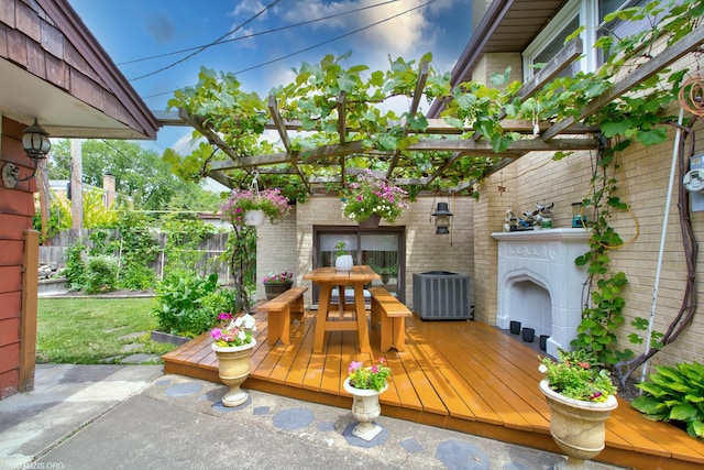 8936 N Elmore St, Niles, IL 60714 - wooden terrace featuring fence, central AC, and a fireplace