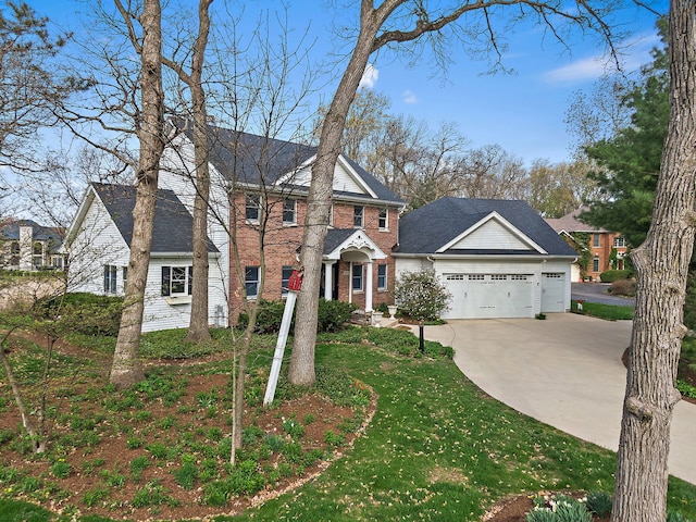 view of front of property featuring an attached garage, driveway, a front lawn, and brick siding